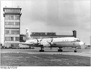 Ein IL-18 der Interflug und der Tower und die Abfertigungshalle des Flughafens Erfurt 1979